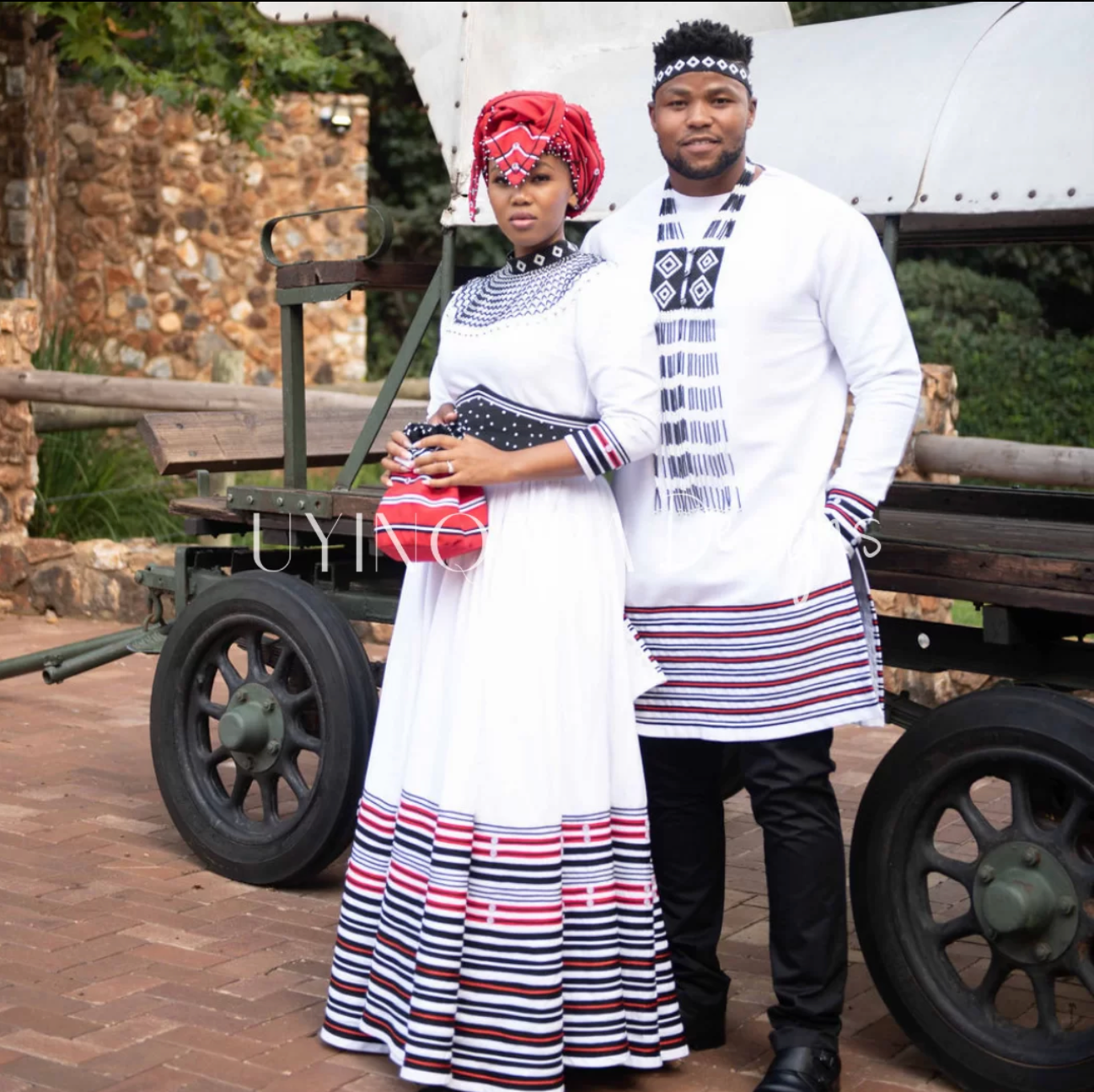 White Makoti and Mkhwenyana Wedding Ensemble